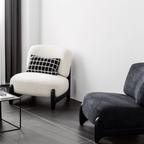 Trendy black and white modern boucle sherpa lounge accent chair with sleek wood legs