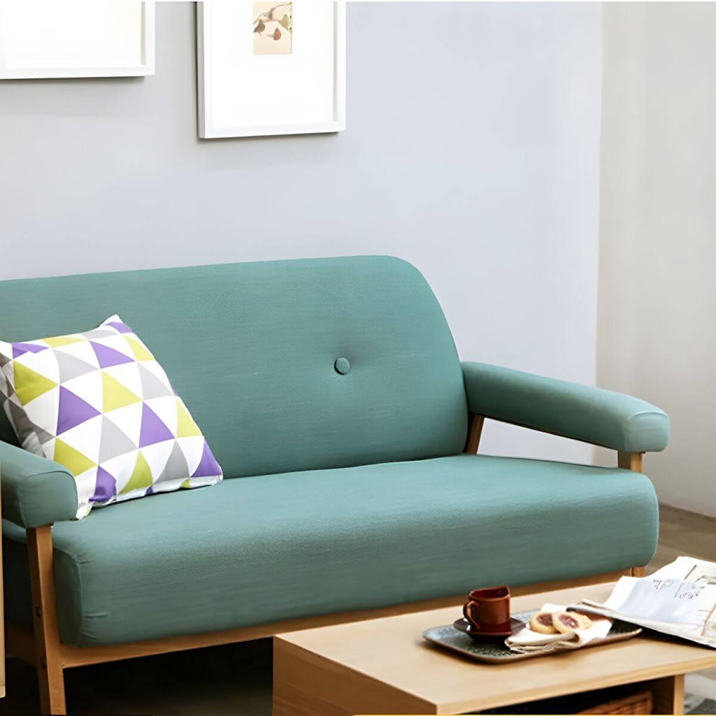 Black Scandinavian style small sofa with wood frame and faux leather upholstery