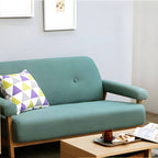 Black Scandinavian style small sofa with wood frame and faux leather upholstery