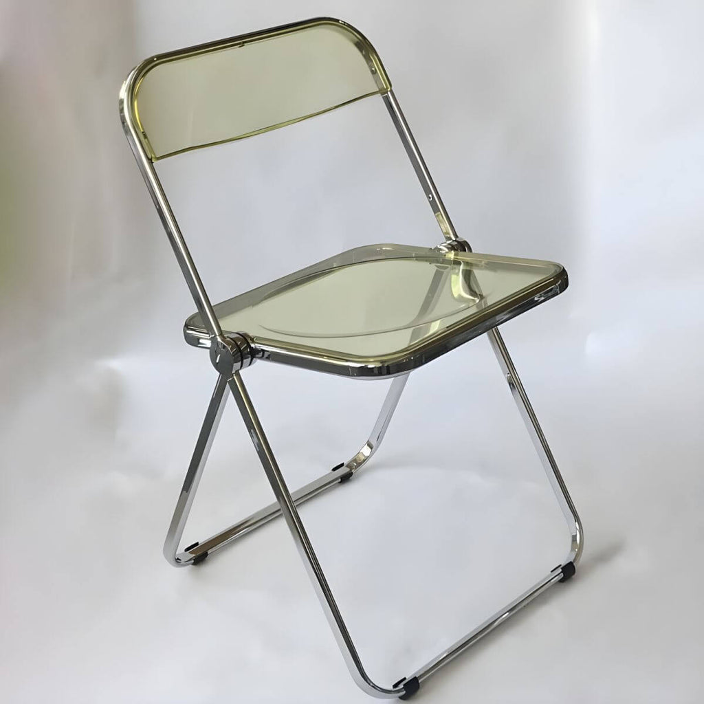 Scandinavian style dining chair with silver metal legs and plastic acrylic seat