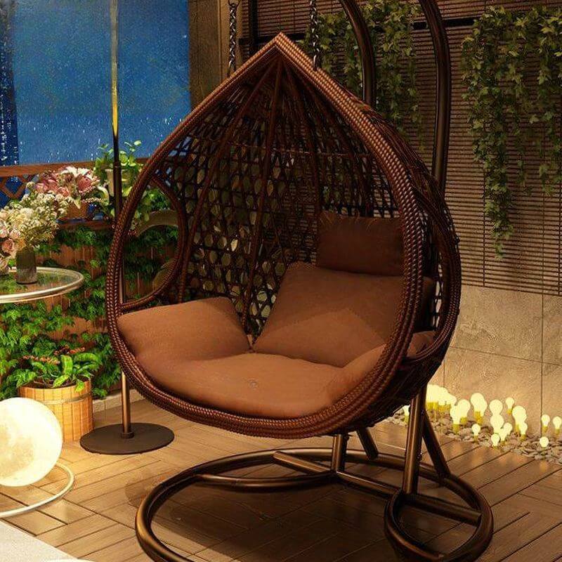 Auburn tropical alloy porch swing with stand, cushions, and chain for outdoor comfort