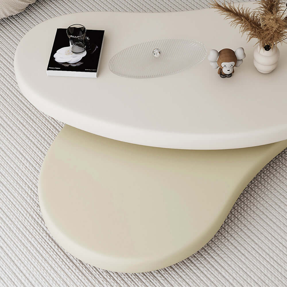 Off-white and beige minimalist rotatable coffee table with unique oval design