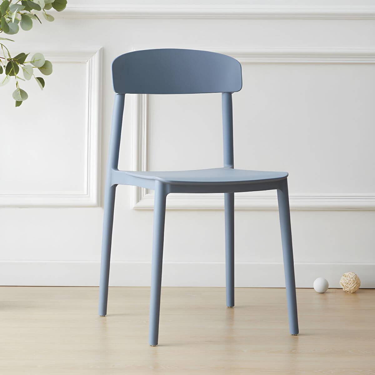 Scandinavian style low back kitchen and dining chair made of plastic and acrylic