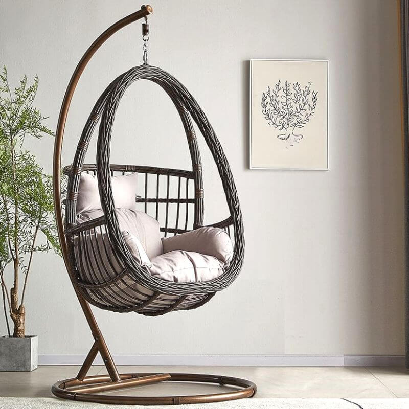 Tropical porch swing with corrosion-resistant cushions, alloy chain, and sturdy stand included