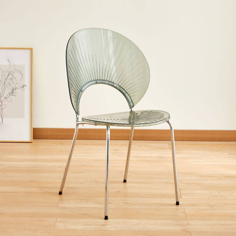 Stackable Scandinavian style dining chair with plastic seat, acrylic back, and silver legs
