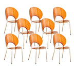 Stackable Scandinavian style dining chair with plastic seat, acrylic back, and silver legs