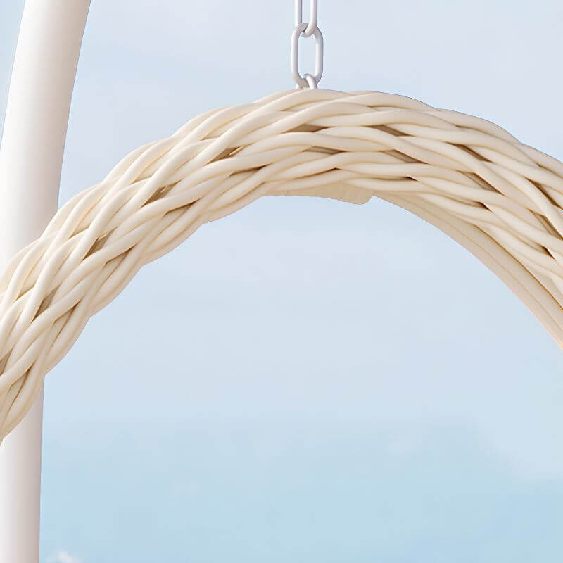 Pink metal 2-seater porch swing with stand, chain, and cushions for outdoor seating