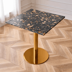 Modern marble table with sturdy metal base, perfect for adding a timeless aesthetic to any space
