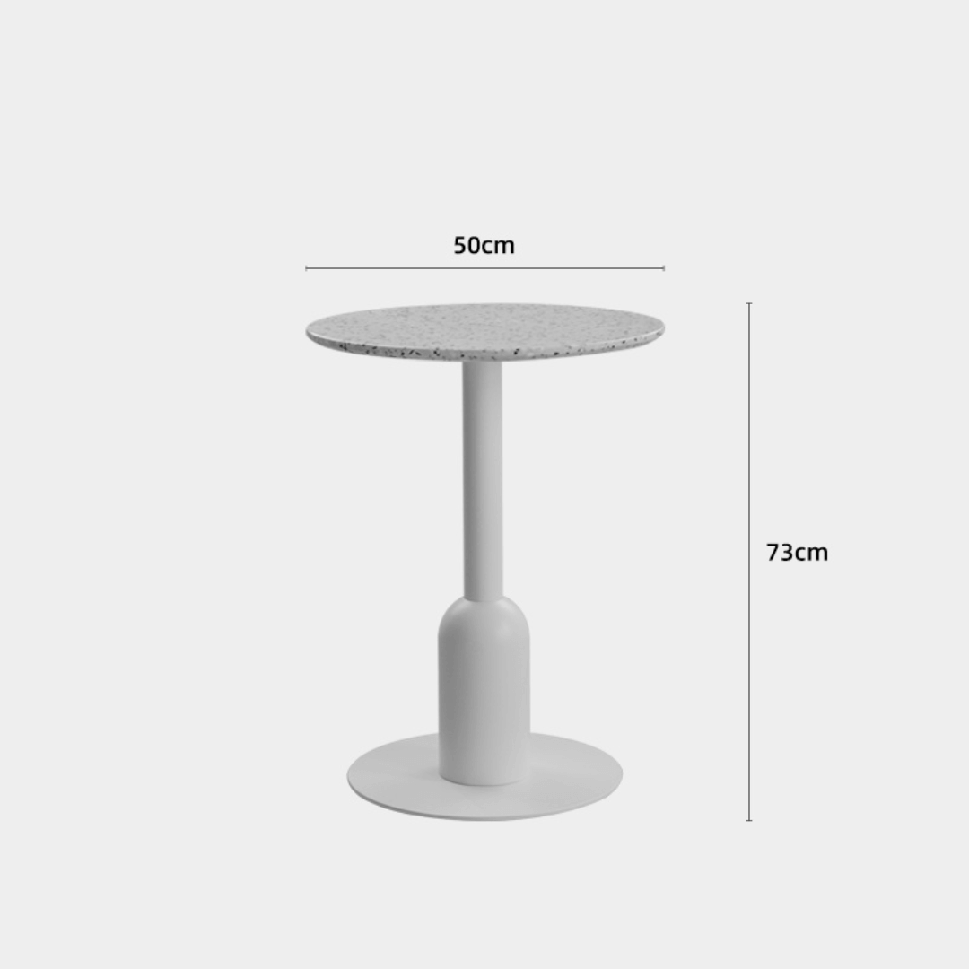 Round terrazzo table ideal for dining or office use with versatile design