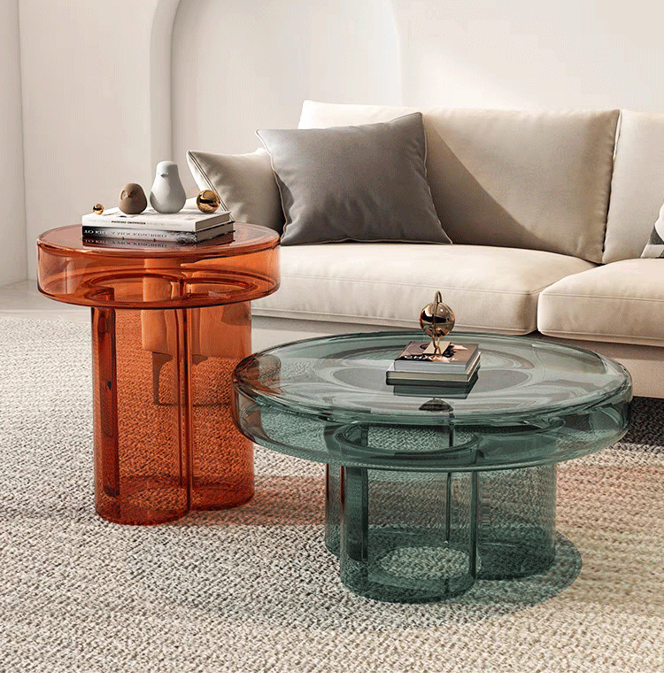 Cloud-shaped modern glass coffee table set with two pieces in vibrant orange, green, purple, and black