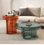 Cloud-shaped modern glass coffee table set with two pieces in vibrant orange, green, purple, and black
