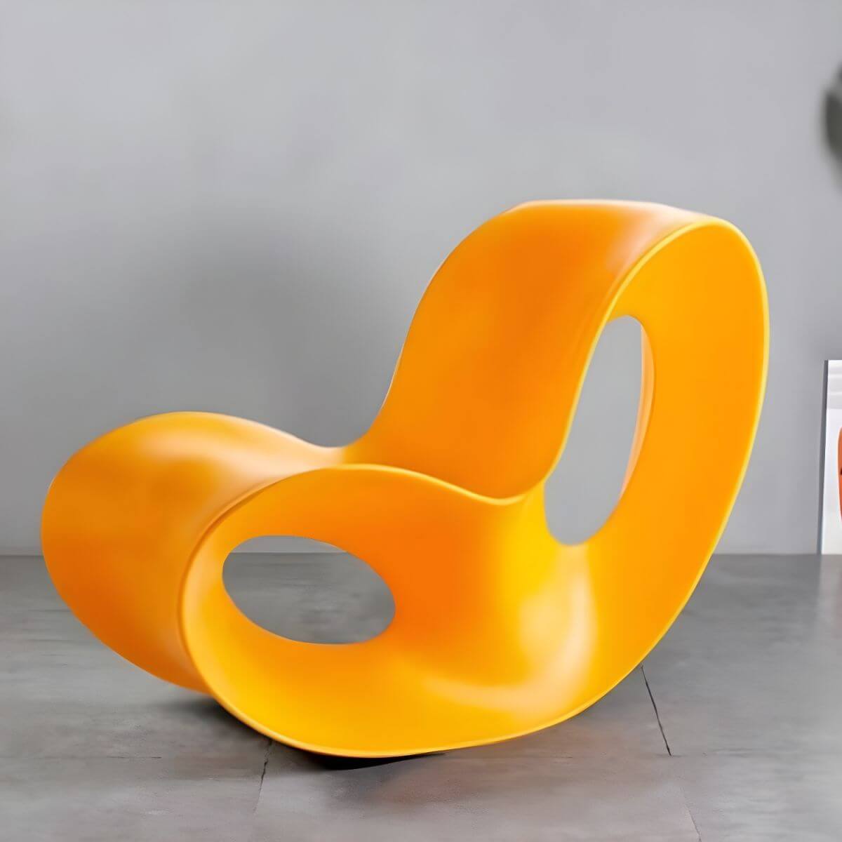 Contemporary plastic and acrylic rocking accent chair with modern design