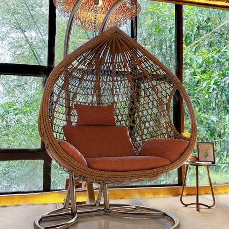 Auburn tropical alloy porch swing with stand, cushions, and chain for outdoor comfort