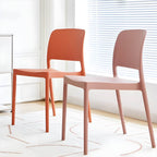 Scandinavian plastic and acrylic dining chair with low backrest and armless design