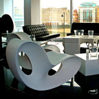 Contemporary plastic and acrylic rocking accent chair with modern design