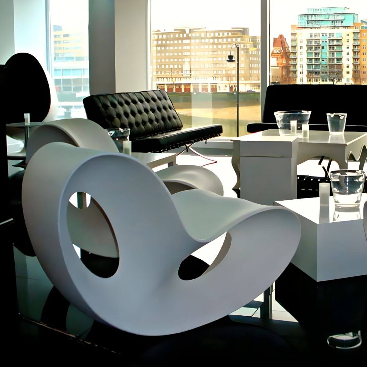 Contemporary plastic and acrylic rocking accent chair with modern design