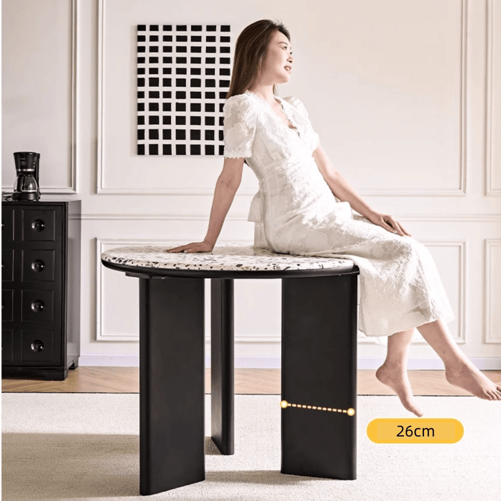 Round terrazzo table with easy-clean surface, perfect for small apartments