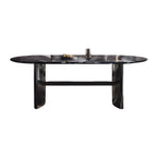 Oval dining table with black marble top and trestle metal base, modern dining room set