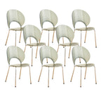 Stackable Scandinavian style dining chair with plastic seat, acrylic back, and silver legs