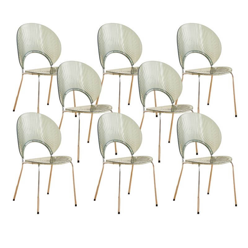 Stackable Scandinavian style dining chair with plastic seat, acrylic back, and silver legs