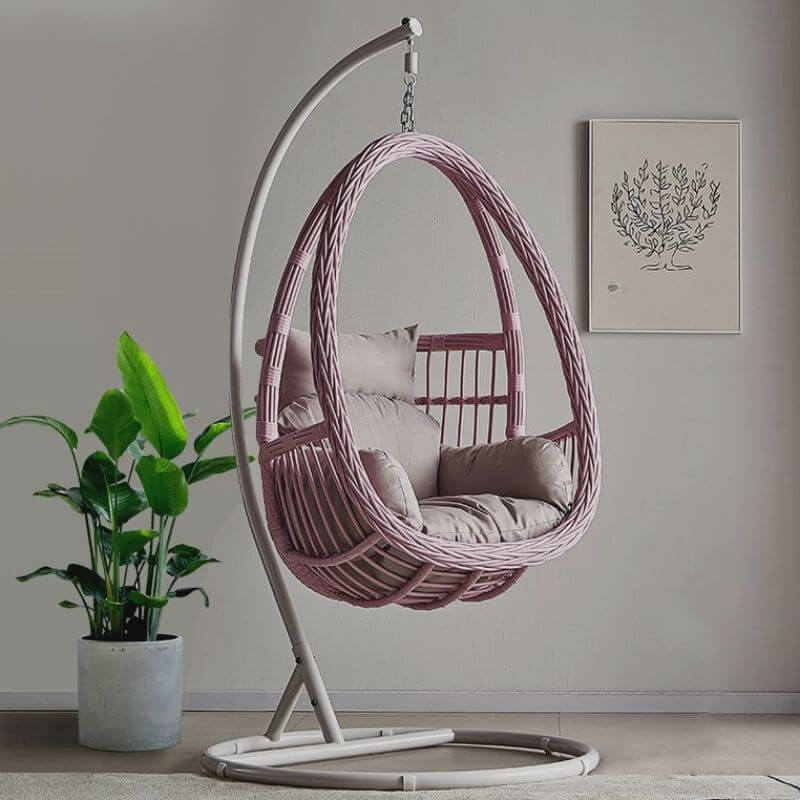 Tropical porch swing with corrosion-resistant cushions, alloy chain, and sturdy stand included