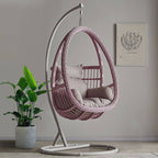 Tropical porch swing with corrosion-resistant cushions, alloy chain, and sturdy stand included