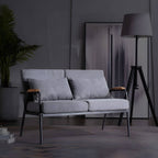 Mid century modern 2-seater sofa with black metal frame and solid wood arms