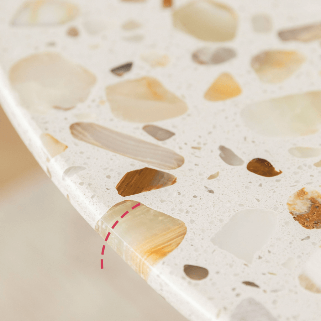 Modern terrazzo dining table with sleek design, perfect for cozy meals and home office use