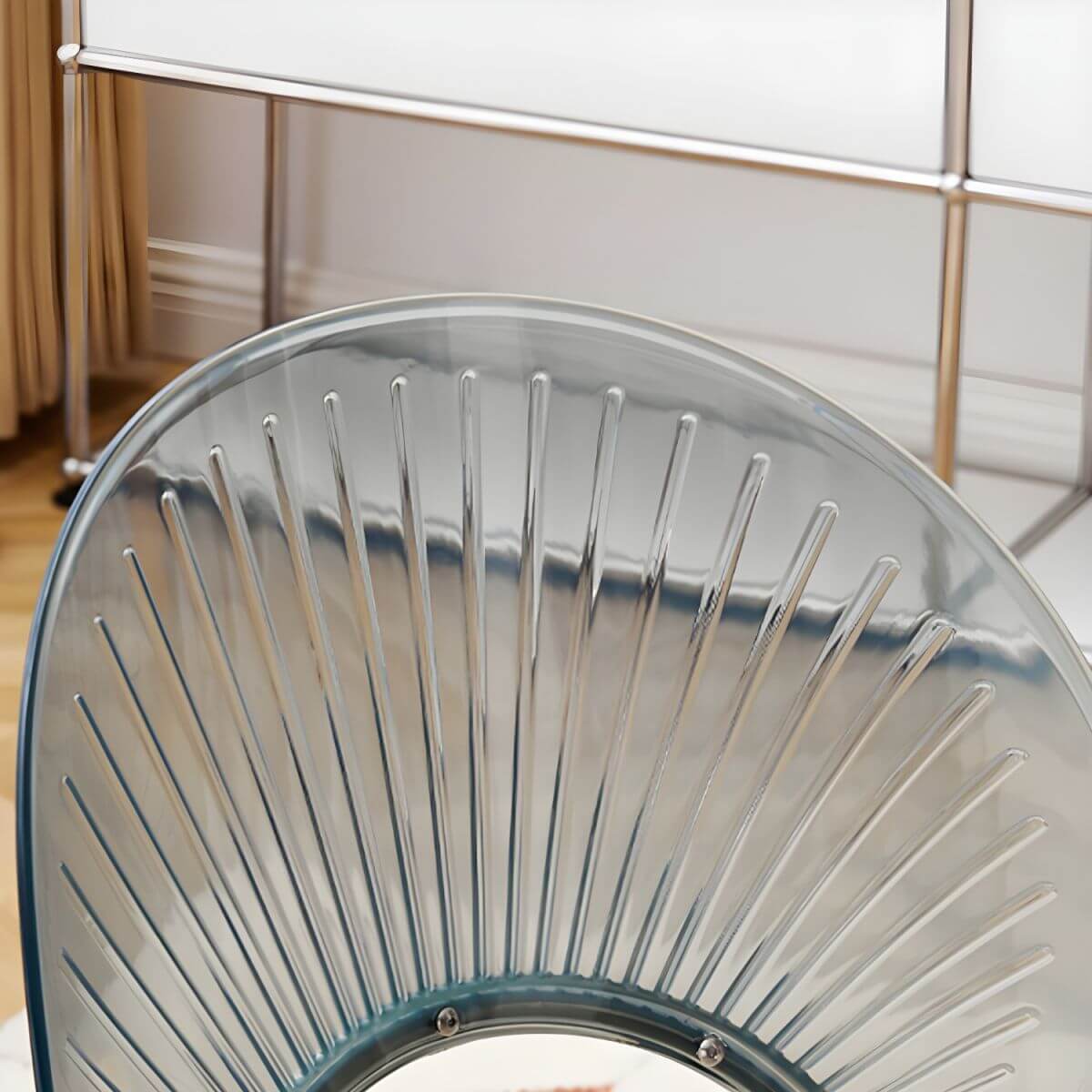 Stackable acrylic dining chair with open back and metal legs, armless design for modern dining rooms