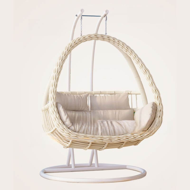 Pink metal 2-seater porch swing with stand, chain, and cushions for outdoor seating