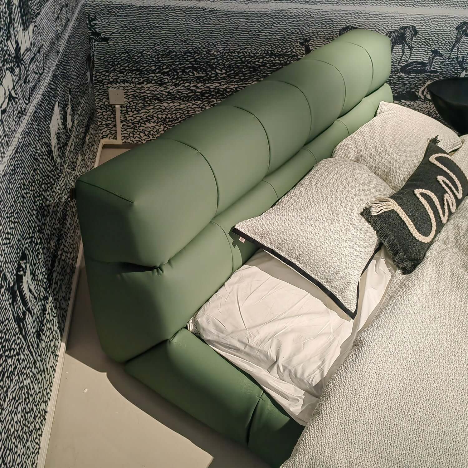 King-sized modern upholstered bed in leather and suede fabric for stylish bedroom decor