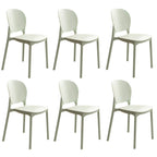 Stackable Scandinavian side chair with open back made of plastic and acrylic for dining