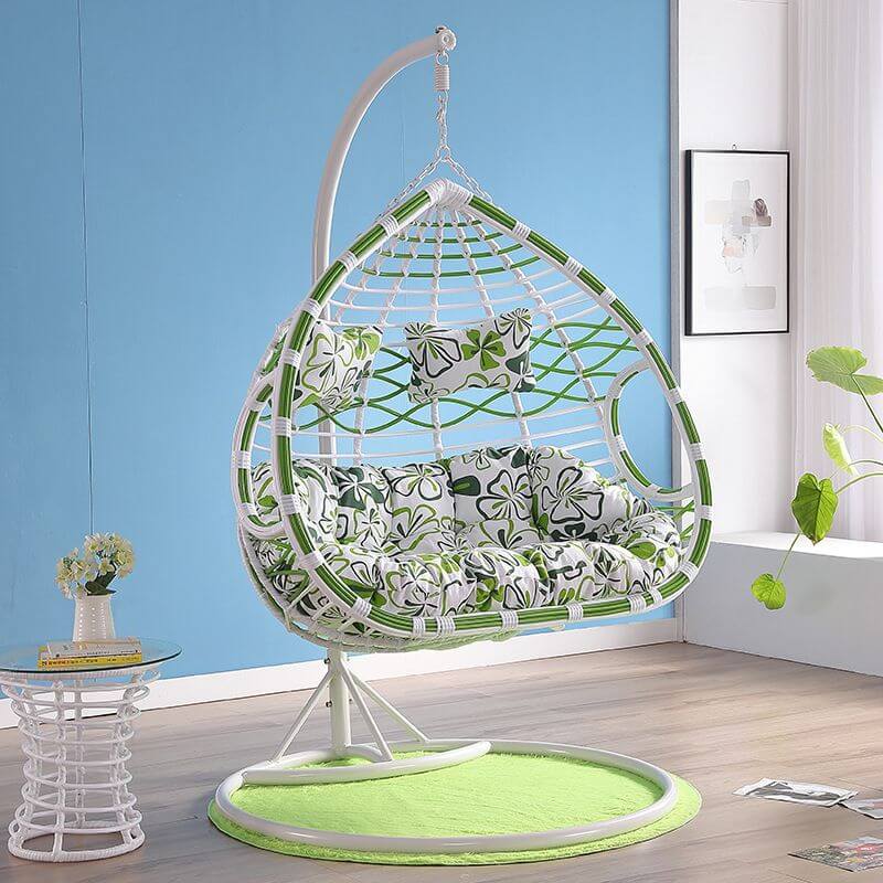 Metal porch swing with cushions, chain, and stand, designed to be heat resistant for outdoor use