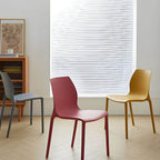 Stackable modern Scandinavian plastic and acrylic chair for kitchen and dining use