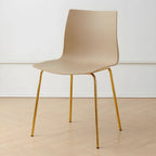 Modern plastic and acrylic side chair with metal legs, ideal for kitchen and dining rooms