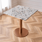 Modern marble table with sturdy metal base, perfect for adding a timeless aesthetic to any space