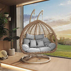 Porch swing with tropical ivory and auburn hydrophobic framed pads, metal stand and chain included