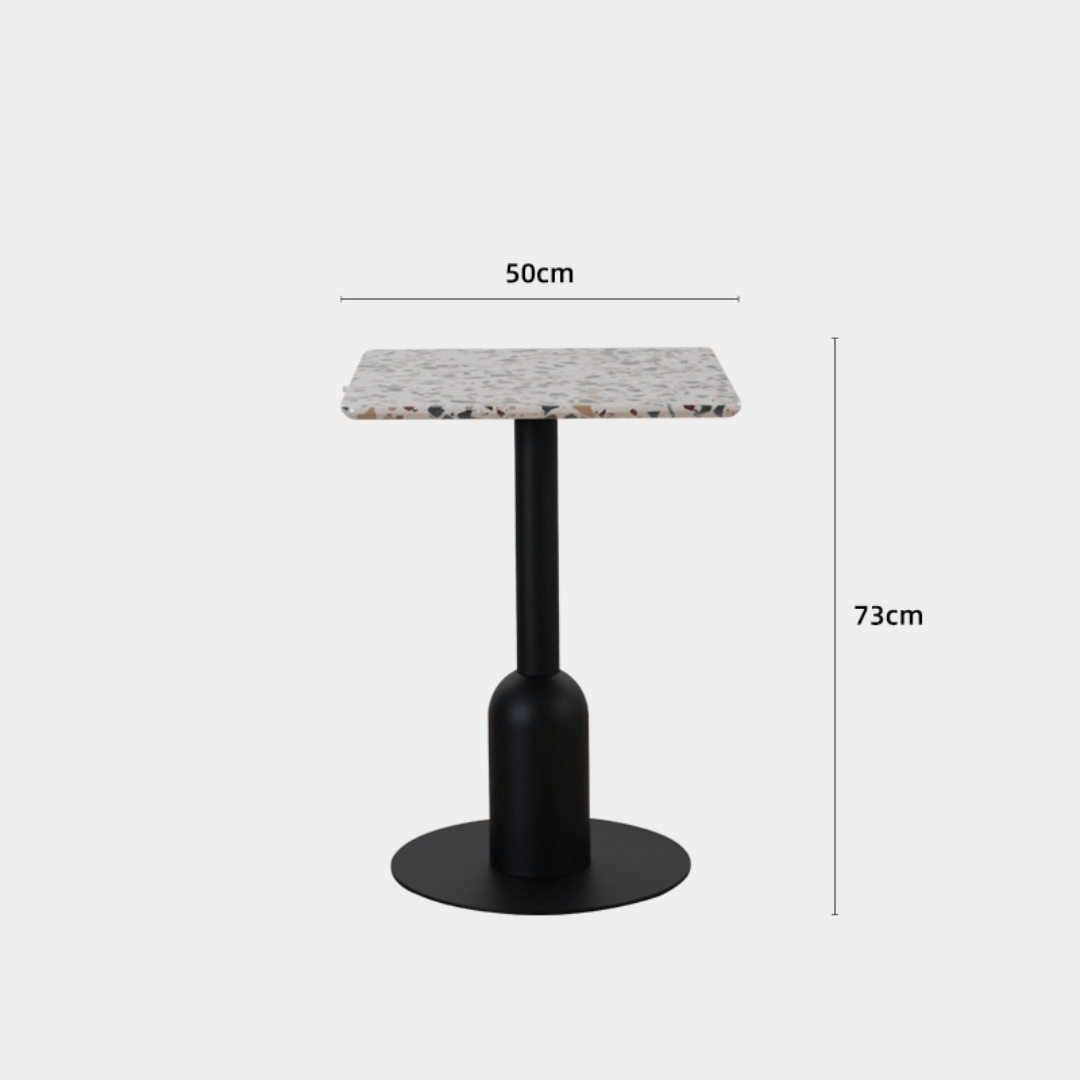 Round terrazzo table ideal for dining or office use with versatile design
