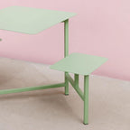 Outdoor picnic table with aluminum frame and colorful white, light green, and orange top