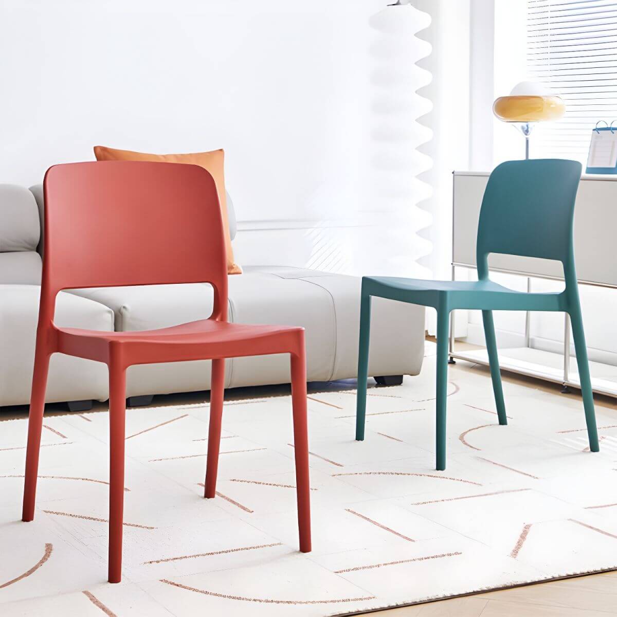 Scandinavian plastic and acrylic dining chair with low backrest and armless design