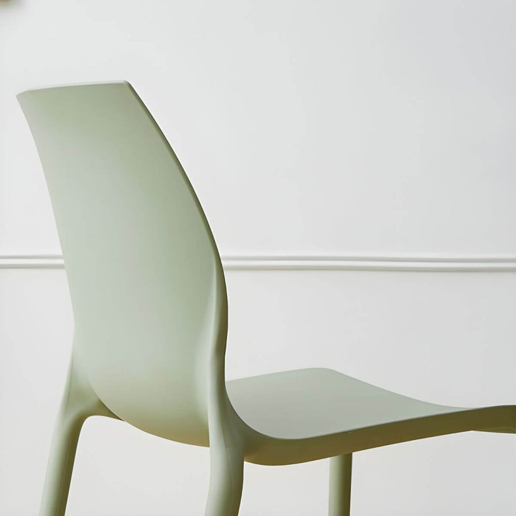 Stackable modern Scandinavian plastic and acrylic chair for kitchen and dining use