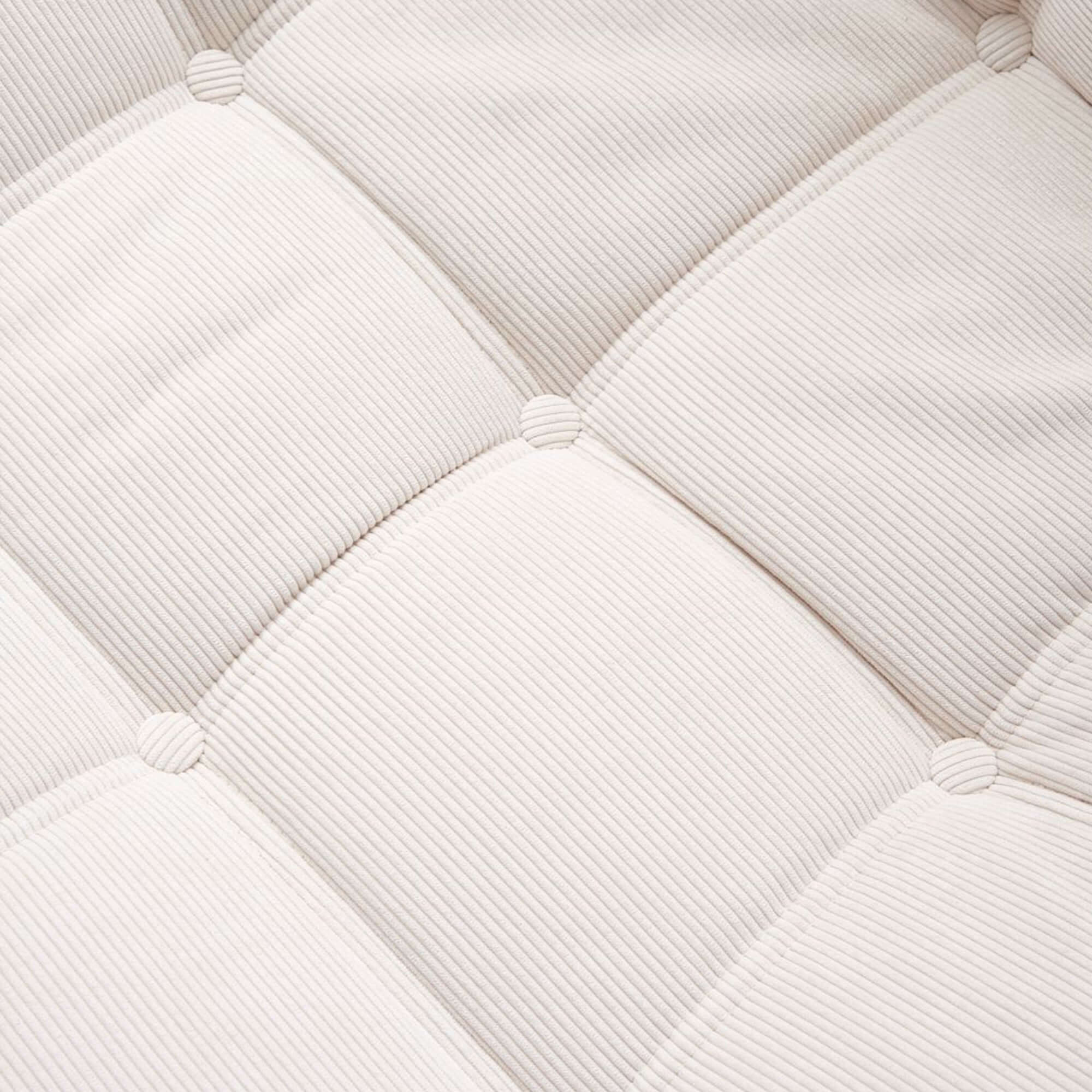 Comfortable tufted corduroy bean bag chair with soft upholstery, perfect for lazy lounging