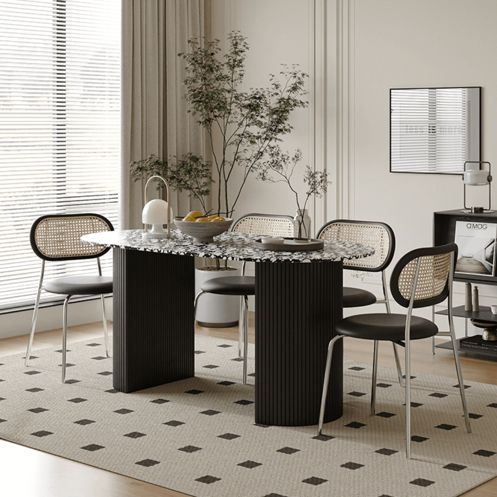Modern black and white terrazzo dining table with sleek vintage design