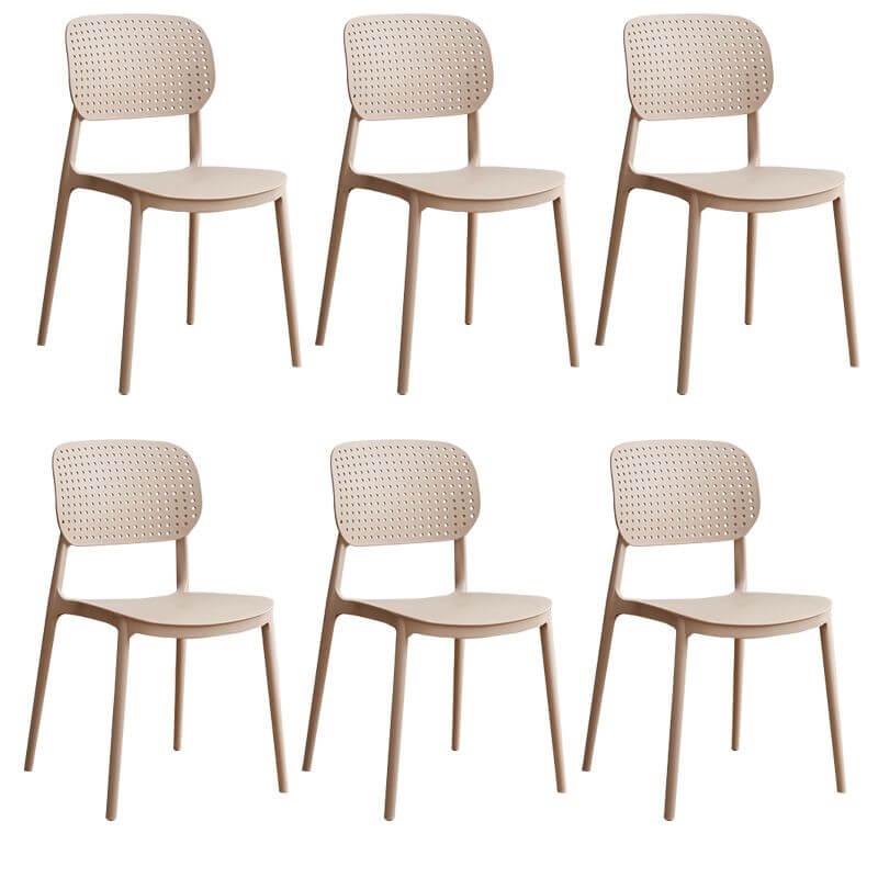 Stackable Scandinavian style plastic and acrylic side chair with low back for dining