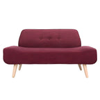 Small Scandinavian style sofa with wood frame and solid color polyester upholstery
