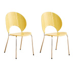 Stackable Scandinavian style dining chair with plastic seat, acrylic back, and silver legs