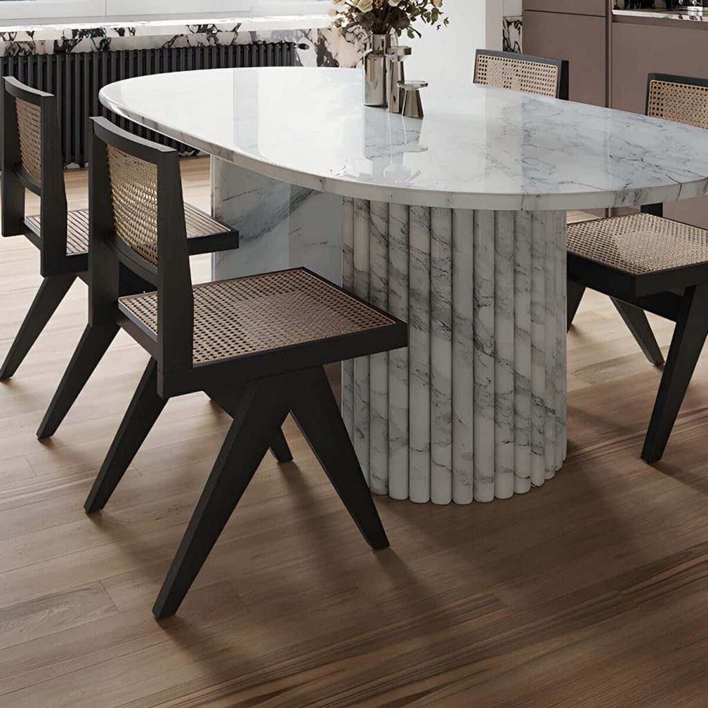 Modern oval marble dining table with white double pedestal base for stylish dining rooms