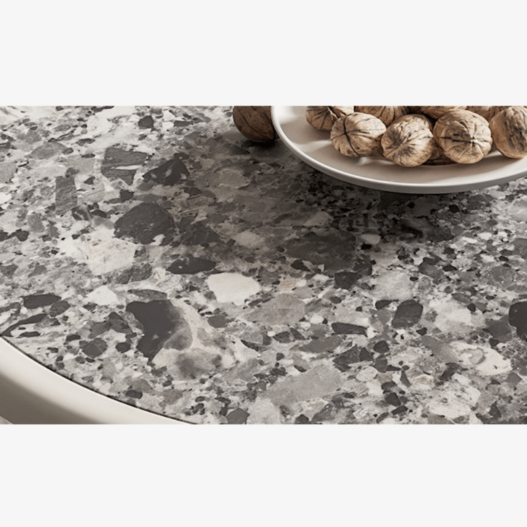 Round terrazzo coffee table with elegant design, perfect for chic home decor