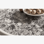 Round terrazzo coffee table with elegant design, perfect for chic home decor