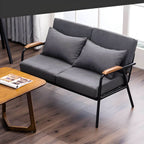 Mid century modern 2-seater sofa with black metal frame and solid wood arms